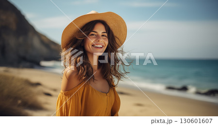 Portrait of a very happy young woman loving the life shes living having fun on the beach 130601607