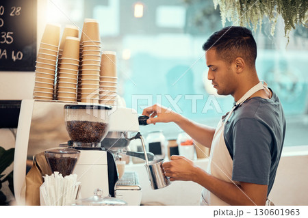 Coffee shop, barista and service with a man at work using a machine to pour a drink in the kitchen. Cafe, small business and waiter with a male employee working in a restaurant to prepare a beverage Coffee shop, barista and service with a man at work using a machine to pour a drink in the kitchen. Cafe, small business and waiter with a male employee working in a restaurant to prepare a beverage 130601963