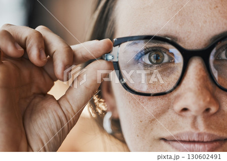 Portrait, eyes and woman with glasses for optical healthcare, prescription or perception. Female, face and spectacles of eye care, optometry and fashion frames for cosmetic beauty, lens choice or see 130602491