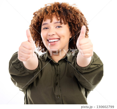 Thumbs up, happy black woman and portrait of a young model in isolated white background studio.Thank you, yes and like emoji hand sign of a female showing okay, agreement and approval gesture 130602799