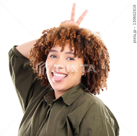 Black woman, tongue out in portrait with peace hand sign and goofy, playful and smile isolated on white background. Happy person, funny face with v, emoji and crazy, comic with female and gen z Black woman, tongue out in portrait with peace hand sign and goofy, playful and smile isolated on white background. Happy person, funny face with v, emoji and crazy, comic with female and gen z 130602816