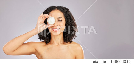 Skincare, face and black woman with cream container in studio isolated on a gray background mockup. Dermatology portrait, cosmetics and happy female with lotion, creme or moisturizer for skin health. Skincare, face and black woman with cream container in studio isolated on a gray background mockup. Dermatology portrait, cosmetics and happy female with lotion, creme or moisturizer for skin health. 130603030