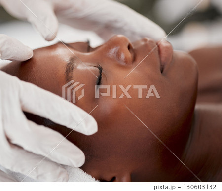 Massage, facial and relax with black woman in spa for holistic treatment, beauty and skincare. Peace, luxury and zen with girl customer in salon for cosmetology, wellness and physical therapy Massage, facial and relax with black woman in spa for holistic treatment, beauty and skincare. Peace, luxury and zen with girl customer in salon for cosmetology, wellness and physical therapy 130603132