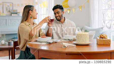 Birthday cake, wine cheers and romantic dinner with a Italian meal together for celebration. Love, man and woman on date with pasta, dessert and anniversary food happy at dining table at a house 130603290