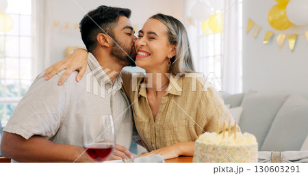 Love, kiss and couple with cake, celebration or happy birthday hug at home. Candles, event and man with woman in a house for anniversary, congratulations or celebrating marriage milestone together Love, kiss and couple with cake, celebration or happy birthday hug at home. Candles, event and man with woman in a house for anniversary, congratulations or celebrating marriage milestone together 130603291