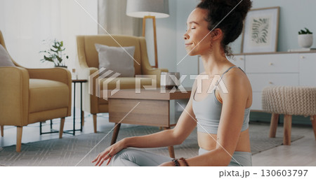 Meditation, pilates and home yoga for black woman working on spiritual chakra peace, freedom of the mind and zen mindset. Body health, wellness lifestyle and relax girl training on living room floor Meditation, pilates and home yoga for black woman working on spiritual chakra peace, freedom of the mind and zen mindset. Body health, wellness lifestyle and relax girl training on living room floor 130603797