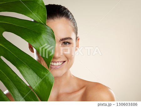 Green plant, skincare and beauty woman portrait for natural dermatology for mockup product space. Face glow skin of aesthetic model in studio for sustainable cosmetic makeup for health and wellness 130603886
