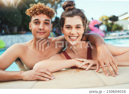 Party, swimming and portrait with a couple of friends in the pool outdoor together during summer. Love, water and diversity with a young man and woman swimmer enjoying a birthday or celebration event 130604038