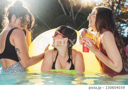 Pool party, summer and friends or women with social celebration, gen z lifestyle and happy conversation. Funny, laugh and young people or youth swimming in water or outdoor with alcohol for holiday Pool party, summer and friends or women with social celebration, gen z lifestyle and happy conversation. Funny, laugh and young people or youth swimming in water or outdoor with alcohol for holiday 130604039