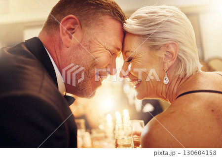 Love, forehead or senior couple in a party in celebration of goals or new year at luxury social event. Romance, happy woman or romantic man smiles enjoy an embrace or bonding at dinner gala together 130604158