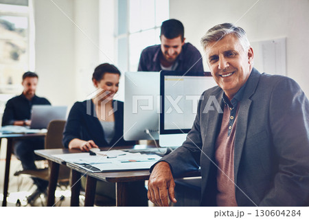 Senior, portrait and business man in office or company workplace. Leadership, ceo and happy elderly male employee working on marketing report, advertising or sales project with coworkers in company. Senior, portrait and business man in office or company workplace. Leadership, ceo and happy elderly male employee working on marketing report, advertising or sales project with coworkers in company. 130604284