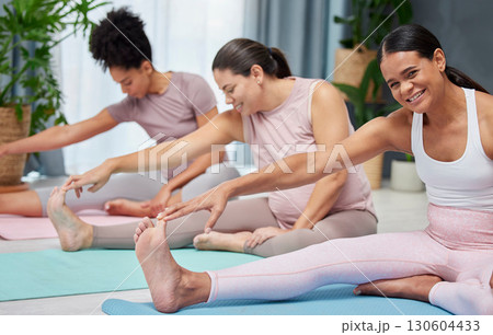 Portrait, friends and yoga by women stretch on floor for fitness, exercise and wellness, happy and relax. Flexible, women and female group stretching for pilates workout, cardio and healthy lifestyle 130604433