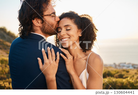 Love, kiss and wedding with couple in nature for celebration, happiness and romance. Sunset, hug and affectionate with bride and groom in embrace at countryside for happy, marriage and smile together Love, kiss and wedding with couple in nature for celebration, happiness and romance. Sunset, hug and affectionate with bride and groom in embrace at countryside for happy, marriage and smile together 130604441