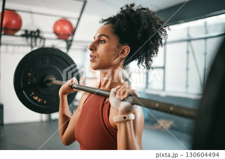 Gym exercise, barbell workout or black woman doing muscle strength training, fitness or bodybuilding. Strong girl, health lifestyle or powerlifting sports athlete, person or bodybuilder weightlifting Gym exercise, barbell workout or black woman doing muscle strength training, fitness or bodybuilding. Strong girl, health lifestyle or powerlifting sports athlete, person or bodybuilder weightlifting 130604494