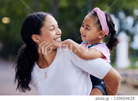 Woman, girl child and smile for piggyback ride in urban park, street and outdoor for love, bonding or care. Excited family, mother and daughter for riding back, comic laugh and relax on vacation walk Woman, girl child and smile for piggyback ride in urban park, street and outdoor for love, bonding or care. Excited family, mother and daughter for riding back, comic laugh and relax on vacation walk 130604628