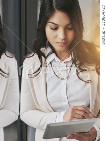 Business woman with tablet, serious and technology, web designer at startup with connection and email with SEO. Digital marketing agency, webdesign and wifi with website development and data analysis Business woman with tablet, serious and technology, web designer at startup with connection and email with SEO. Digital marketing agency, webdesign and wifi with website development and data analysis 130604727