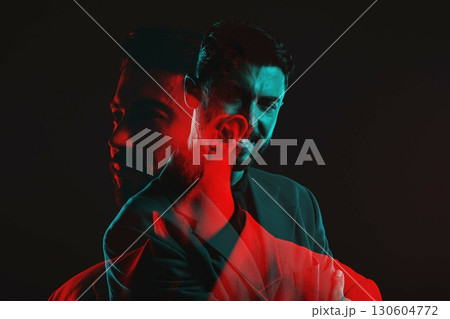 Fashion, double exposure and portrait of man with neon lighting in vintage clothes, elegant and classy suit. Creative, aesthetic and face of male with luxury, designer and stylish clothes in studio Fashion, double exposure and portrait of man with neon lighting in vintage clothes, elegant and classy suit. Creative, aesthetic and face of male with luxury, designer and stylish clothes in studio 130604772