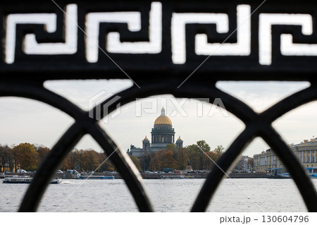 Saint Isaacs Cathedral is viewed through a decorative black iron fence Saint Isaacs Cathedral is viewed through a decorative black iron fence 130604796