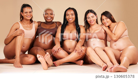 Portrait, bonding and pregnant women sitting on floor in community, diversity support or body empowerment. Smile, happy and pregnancy friends in underwear for healthcare wellness, future baby or love Portrait, bonding and pregnant women sitting on floor in community, diversity support or body empowerment. Smile, happy and pregnancy friends in underwear for healthcare wellness, future baby or love 130605378
