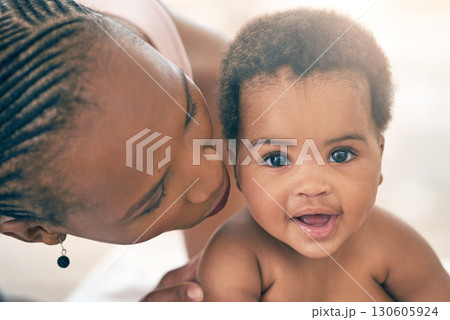 Mother with baby, face and hug with family, content and bonding with love and early childhood, female and happiness. Black woman, mom holding child with parenting, motherhood and cuddle with care Mother with baby, face and hug with family, content and bonding with love and early childhood, female and happiness. Black woman, mom holding child with parenting, motherhood and cuddle with care 130605924