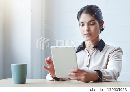 Business woman, tablet and thinking in office with vision, internet research and strategy for goals. Young executive, computer and brainstorming for ideas, focus and website management in workplace 130605938