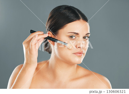 Woman, facial beauty and makeup brush portrait for wellness, cosmetics dermatology and skincare in studio. Model, application and cosmetology lifestyle or luxury product tools for self care glow 130606321