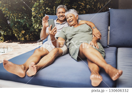 Senior couple, relax and smile for video call, social media or selfie together on outdoor patio at home. Happy elderly man and woman relaxing on comfortable cushion for online chat or communication Senior couple, relax and smile for video call, social media or selfie together on outdoor patio at home. Happy elderly man and woman relaxing on comfortable cushion for online chat or communication 130606332