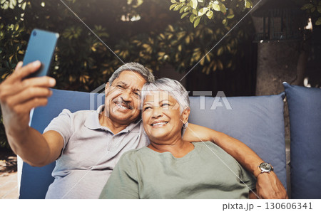 Relax, smile and senior couple with a selfie on an outdoor couch during retirement holiday in Spain. Happy, communication and elderly man and woman with a photo for a memory, streaming and social app Relax, smile and senior couple with a selfie on an outdoor couch during retirement holiday in Spain. Happy, communication and elderly man and woman with a photo for a memory, streaming and social app 130606341