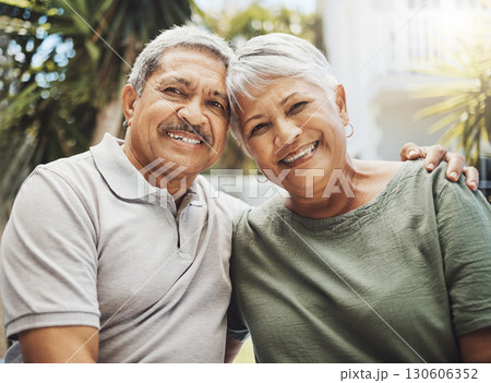 Senior african couple, smile portrait and hug for love, support and care in relationship embrace, bond or happiness outdoor. Romance, happy marriage or elderly black man and woman on holiday together 130606352