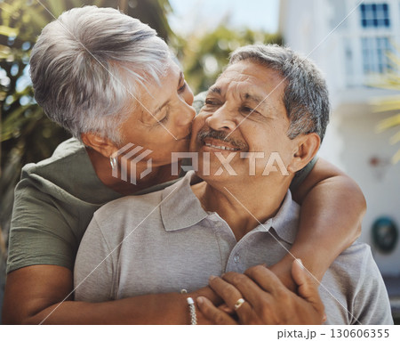 Black senior couple, hug and kiss for love, retirement holiday and happiness outdoor together. African man, woman kissing and happy quality time or marriage relationship bonding on travel vacation Black senior couple, hug and kiss for love, retirement holiday and happiness outdoor together. African man, woman kissing and happy quality time or marriage relationship bonding on travel vacation 130606355