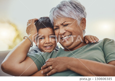 Happy, grandmother and grandchild on a sofa, smile and laugh, love and family while bonding in their home. Relax, grandma and child embrace, funny and joke on a couch, loving and sweet in living room Happy, grandmother and grandchild on a sofa, smile and laugh, love and family while bonding in their home. Relax, grandma and child embrace, funny and joke on a couch, loving and sweet in living room 130606385