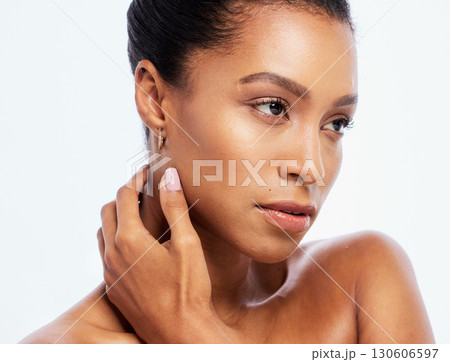Black woman, beauty and skincare for face in studio with dermatology, cosmetics and natural makeup. Aesthetic model person with luxury spa facial and healthy glow on skin isolated on white background 130606597