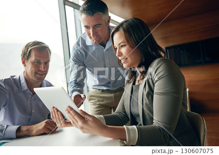 Business people, tablet and team with tech and collaboration in business meeting, corporate and working together. Teamwork, check digital information or document, wifi internet and communication 130607075