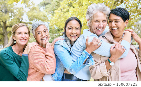 Friends, park and group of women hug enjoying bonding, quality time and relax in nature together. Diversity, friendship and portrait of happy senior females with smile, embrace and peace outdoors Friends, park and group of women hug enjoying bonding, quality time and relax in nature together. Diversity, friendship and portrait of happy senior females with smile, embrace and peace outdoors 130607225