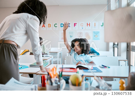 Question, school and education with a black girl student hand raised in a classroom to ask or answer her teacher. Kids, asking and learning with a young female child in class to study for growth Question, school and education with a black girl student hand raised in a classroom to ask or answer her teacher. Kids, asking and learning with a young female child in class to study for growth 130607538