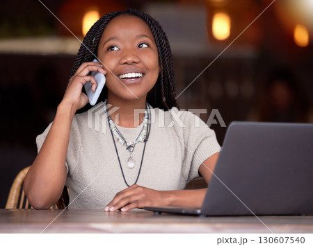 Black woman, phone call and laptop with smile at cafe for communication, conversation or discussion. Happy African American female freelancer smiling and talking on mobile smartphone by computer Black woman, phone call and laptop with smile at cafe for communication, conversation or discussion. Happy African American female freelancer smiling and talking on mobile smartphone by computer 130607540