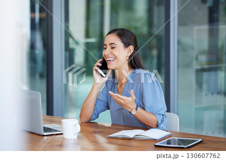 Phone call, communication and laugh with a business woman talking while sitting in her office for work. Laptop, mobile or internet with a female employee working at her desk and laughing at a joke Phone call, communication and laugh with a business woman talking while sitting in her office for work. Laptop, mobile or internet with a female employee working at her desk and laughing at a joke 130607762