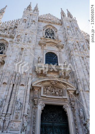 Church Milan Cathedral Duomo di Milano. Gothic architecture tourist attraction on piazza in Milan Lombardia Italy 130608074