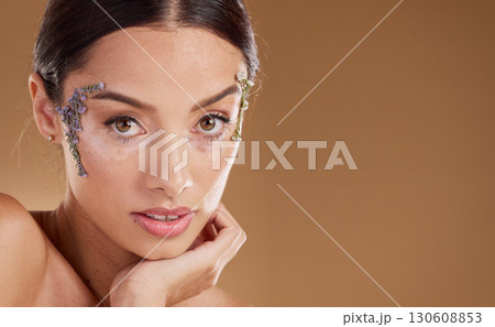 Natural skincare, lavender flowers and woman with eco friendly cosmetics, facial product and beauty mockup. Sustainable dermatology, spa salon and face portrait of aesthetic model with floral makeup Natural skincare, lavender flowers and woman with eco friendly cosmetics, facial product and beauty mockup. Sustainable dermatology, spa salon and face portrait of aesthetic model with floral makeup 130608853