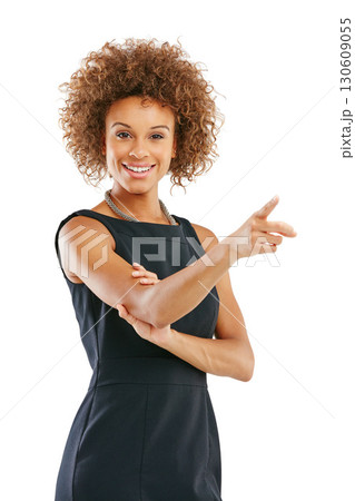 Portrait, black woman and hand pointing to mockup in studio for advertising on white background. Face, finger and gesture by businesswoman for vision or marketing, idea and product placement isolated 130609055