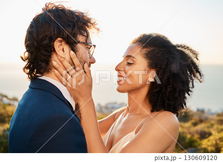 Married couple, smile and love for embrace, care or marriage in bonding relationship in the nature outdoors. Happy bride and groom smiling in joyful happiness for affection, compassion and romance 130609120