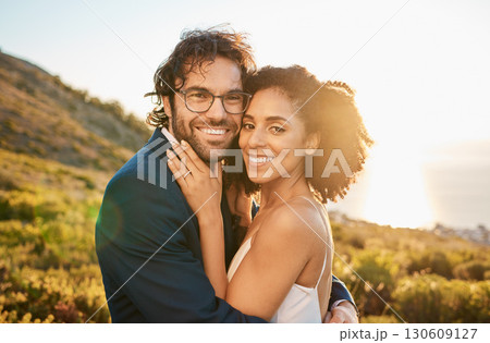 Portrait, wedding couple and interracial marriage hug in nature, happy and excited while celebrating love, beginning and romance. Face, bride and groom by black woman and man embrace, sweet and smile Portrait, wedding couple and interracial marriage hug in nature, happy and excited while celebrating love, beginning and romance. Face, bride and groom by black woman and man embrace, sweet and smile 130609127