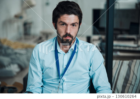 Technician, programmer and portrait of a man in a office for engineering service, maintenance or repairs. Information technology, professional and serious male IT engineer working in a workshop. Technician, programmer and portrait of a man in a office for engineering service, maintenance or repairs. Information technology, professional and serious male IT engineer working in a workshop. 130610264