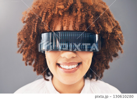 Futuristic glasses, face and black woman isolated on gray background metaverse, cyberpunk and virtual reality. VR vision technology, future ai and digital high tech of gen z model or person headshot Futuristic glasses, face and black woman isolated on gray background metaverse, cyberpunk and virtual reality. VR vision technology, future ai and digital high tech of gen z model or person headshot 130610280