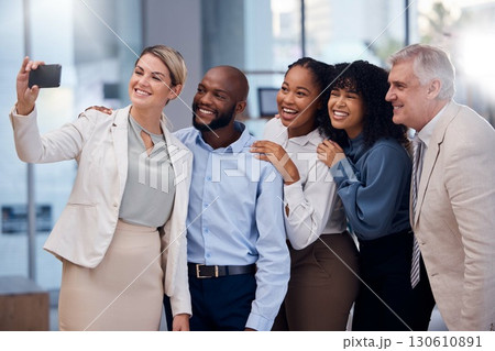 Happy, selfie and smile with business people in office for community, support and diversity. Positive, technology and social media with picture of group of employee for teamwork, friends or internet 130610891