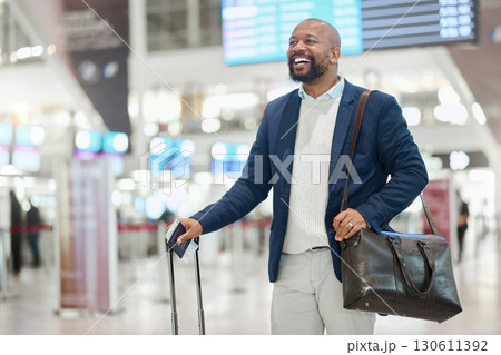 African businessman, walking and airport with smile, happy and luggage on global business trip. Corporate black man, international travel or excited at terminal for immigration, work or career growth 130611392