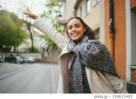 Woman, travel and hailing taxi hand in city, street or New York road in transportation, traveling and commute. Happy tourist, student and person waiting for cab, lift stop or sightseeing location bus 130611485