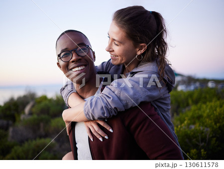 Love, nature and interracial couple piggyback on mountain adventure for holiday, vacation and hiking on weekend. Travel, dating and happy man carry woman enjoying calm, outdoor freedom and peace Love, nature and interracial couple piggyback on mountain adventure for holiday, vacation and hiking on weekend. Travel, dating and happy man carry woman enjoying calm, outdoor freedom and peace 130611578