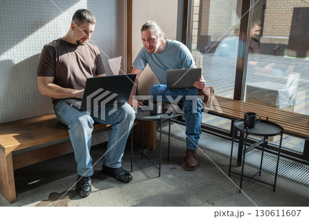 Business project team working together at meeting room at office. Programmers working in the office of a software development company. Coding technologies, site design 130611607