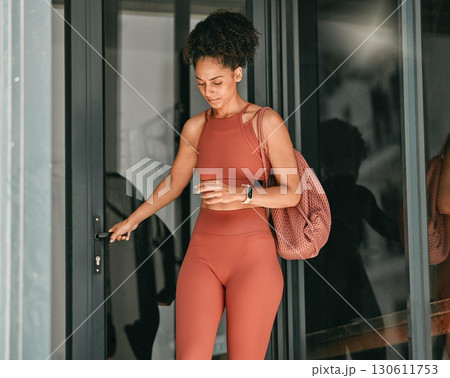 Ready, welcome and door with black woman in gym for workout, exercise and motivation. Training, wellness and sports with girl athlete and bag for cardio, endurance and stamina goal lifestyle 130611753